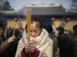 Čínski aktivisti vyzývajú ľudí, aby sa obliekli do čierneho