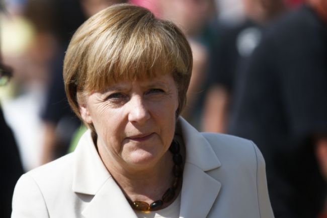Nemci v nedeľu rozhodnú, či zostane Merkelová kancelárkou