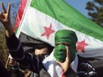Al-Asad varuje Turecko, že zaplatí za podporu povstalcov