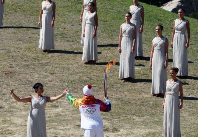 Olympijský oheň sa na potulkách Ruskom ponorí aj do Bajkalu