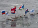 Video: Olympijská pochodeň sa kúpala v Bajkalskom jazere