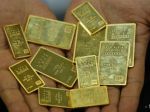 V dome vyšetrovaného čínskeho papaláša sa našli milióny a 37 kíl zlata