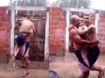 Video: Otec nesie postihnutého syna, aby pocítil dážď