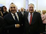 Šéfovia diplomacií Grécka a Turecka rokovali o migrantoch