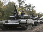 Putina, Merkelovú a Hollanda znepokojila eskalácia bojov na Ukrajine