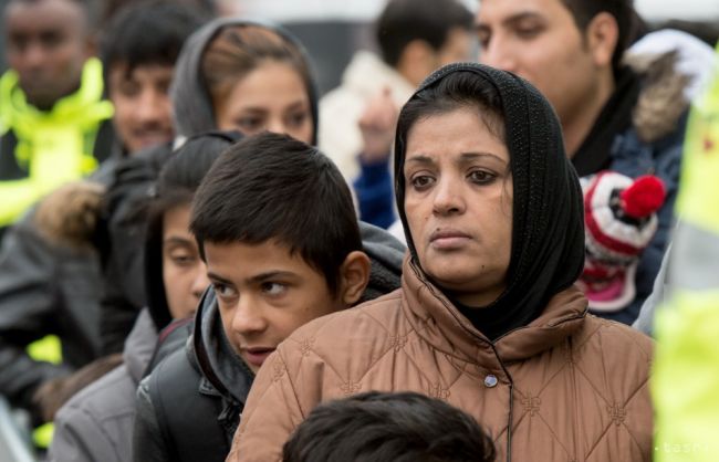 De Maiziere: Do Nemecka prišlo vlani 890.000 migrantov