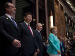 Merkelová, Hollande a Putin budú rokovať o Ukrajine