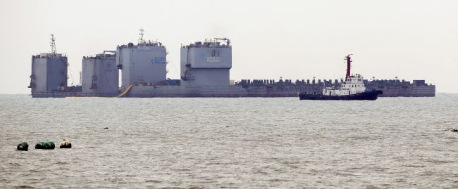 Kórea: Začali s vyťahovaním potopeného trajektu Sewol