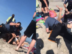 Video: Policajti zbili ženu na pláži. Nevedeli, že ich natáčajú
