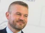 Premiér: Pád Berlínskeho múru bol asi najviditeľnejším dôkazom meniaceho sa sveta