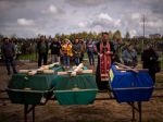 V okolí Kyjeva našli takmer 1200 mŕtvych